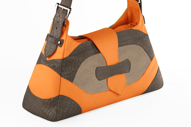 Handcrafted women's luxurious elegant handbag in premium taupe brown, tan beige and apricot orange leather. Perfect for elevated everyday style.   
                Choose from our luxurious collections of leather and fabric to perfectly match your handbags to your outfits.